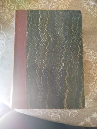 Libro tapa dura con diseño marmoleado