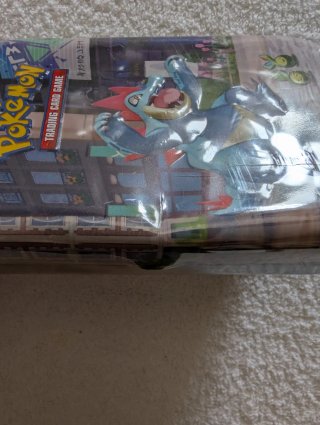Mini lata Pokémon tcg ciudad Luminalia sin abrir