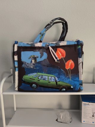 Bolso de mano con estampado collage