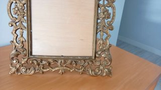 Marco antiguo de bronce