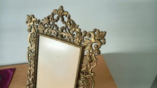 Marco antiguo de bronce
