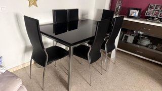 Mesa de comedor negra con 6 sillas