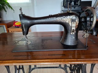 Máquina de coser singer vintage era industrial