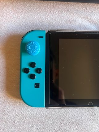 Nintendo Switch Roja y Azul con Funda y protector