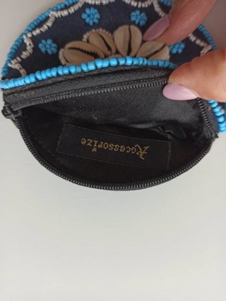 Monedero denim con conchas naturales a estrenar
