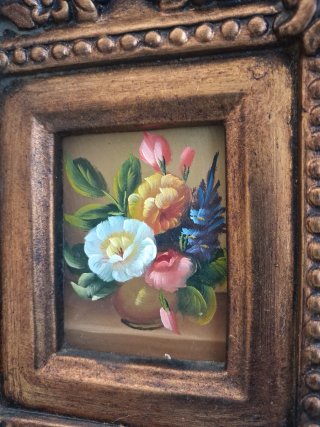 Quadro floreale in resina dorata