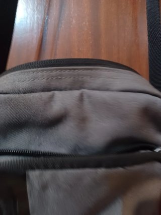 Bandolera Nike gris