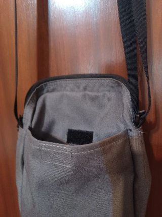 Bandolera Nike gris
