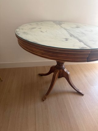 Mesa de comedor redonda con cristal