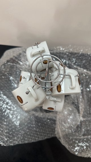 Juego de 6 tazas de café con platillos