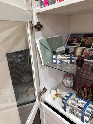 Vitrina de salón de cristal y madera