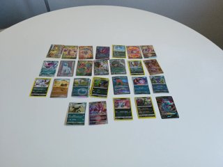 Paquete de Cartas Pokémon tipo oscuro