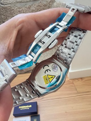 Reloj Poedagar nuevo.