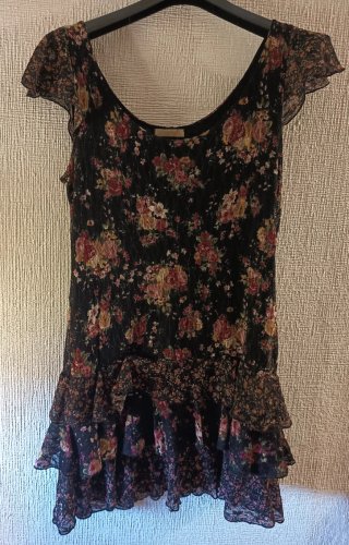 Vestido corto volantes floral negro