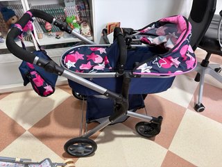 Cochecito de juguete y silla de paseo de juguete