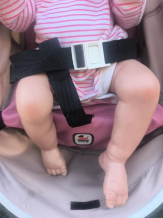 Muñeca reborn bebé con carrito y accesorios