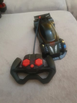 Coche teledirigido negro con mando