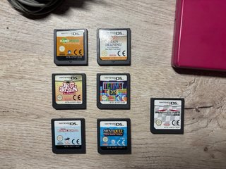 Nintendo DSi Rosa + Mario Kart + 10 giochi + Carica