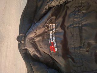 Chaqueta de moto negra y gris