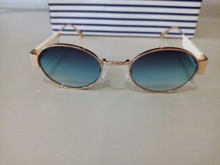 Gafas de sol Carolina Lemke azules y doradas