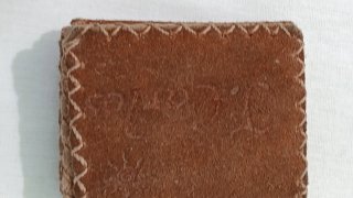 Cartera artesanal de cuero