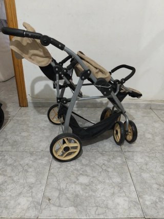 Cochecito de juguete para muñecas