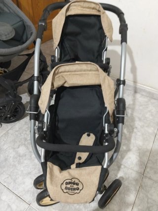 Cochecito de juguete para muñecas