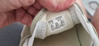 Zapatillas Vans Slip-On Beige y verde clarito.