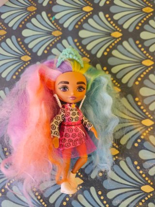 Muñeca con accesorios