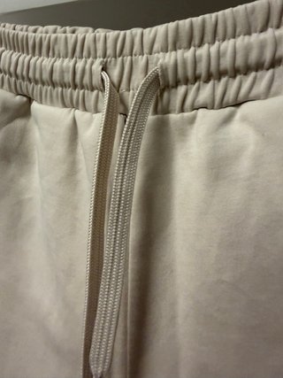 Pantalón rosa claro con cordón