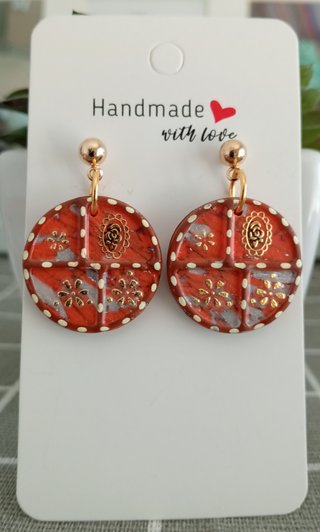 Pendientes artesanales circulares naranjas y dorad
