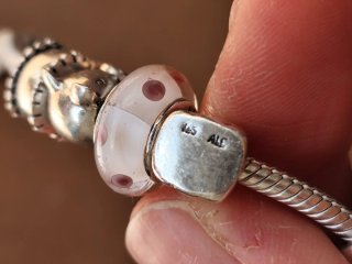 Pulsera Pandora con charms plata