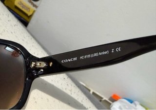 Elegantes gafas de sol Coach beige y marrones
