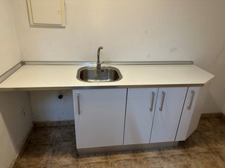Mueble lavadero blanco con seno