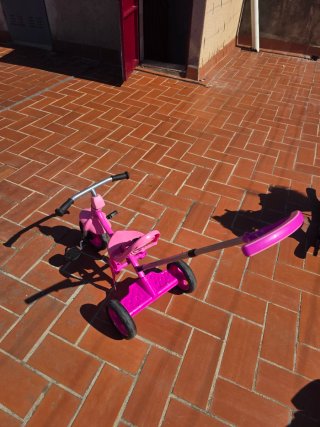 Triciclo rosa para niña