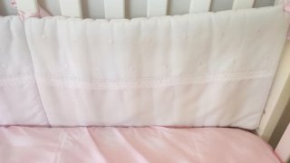 Chichonera para cuna rosa y blanca