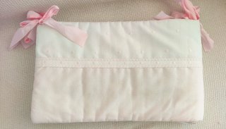 Chichonera para cuna rosa y blanca