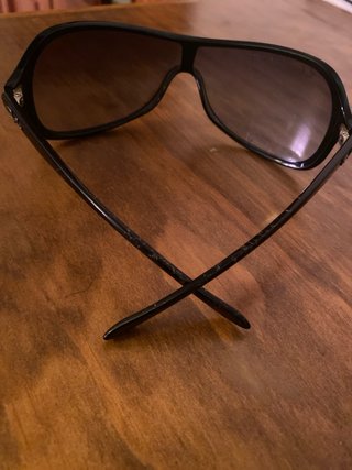 Gafas de sol Ray-Ban negras y marrones