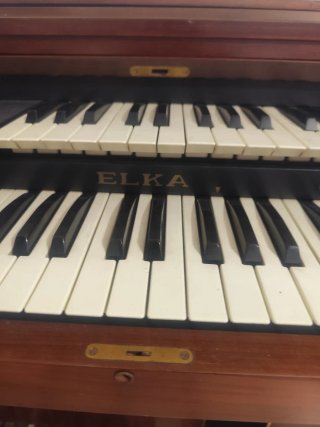 Piano doble teclado madera