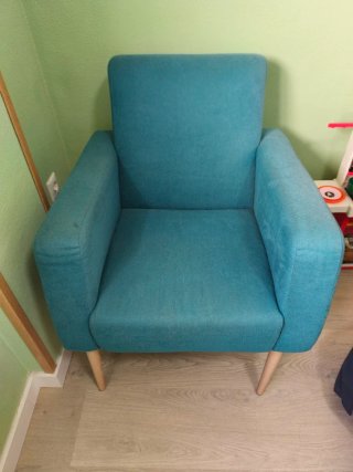 Sillón azul turquesa de tela