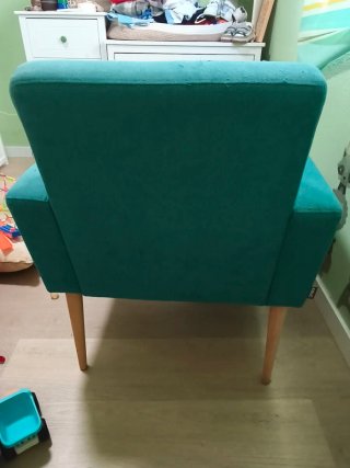 Sillón azul turquesa de tela
