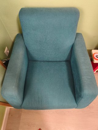 Sillón azul turquesa de tela