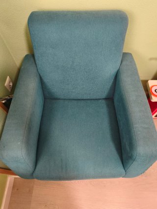 Sillón azul turquesa de tela