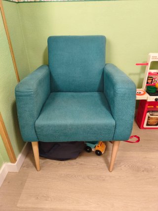 Sillón azul turquesa de tela