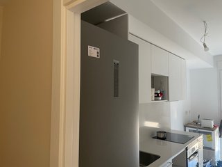 Cocina con encimera, fregadero y grupo filtrante