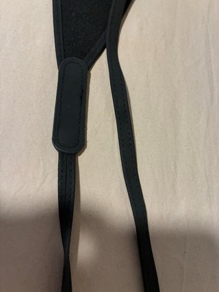 Cinturón tipo fajín negro.