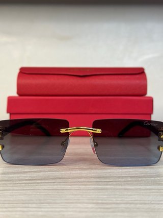 Occhiali da sole Cartier oro