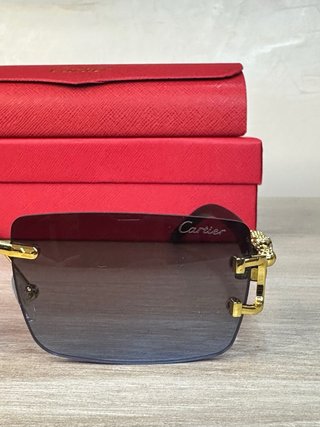 Occhiali da sole Cartier oro