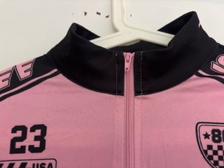 Top rosa F1 con cremallera talla M