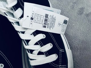 Zapatillas altas negras y blancas
